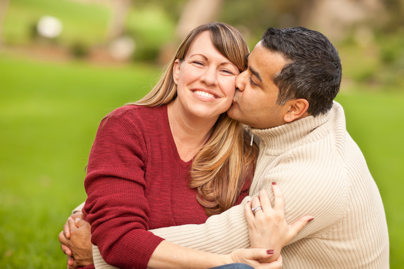 Attractive Mixed Race Couple Portrait in the Park.