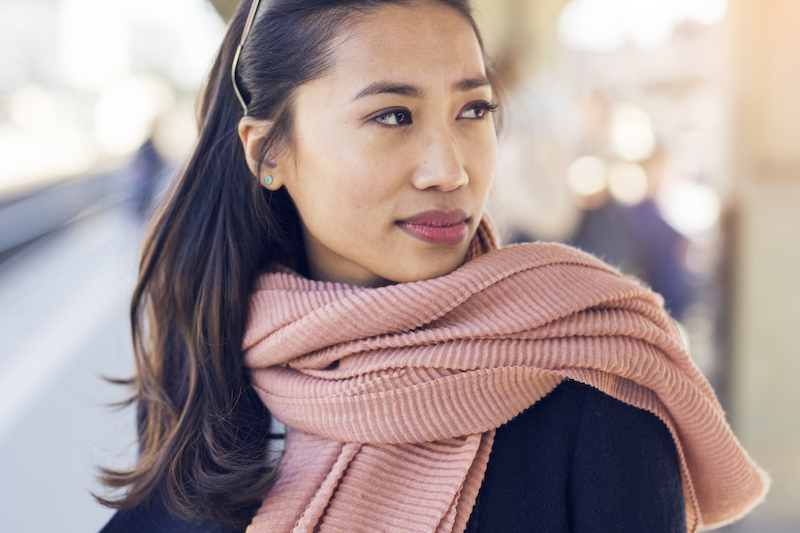 Portrait of young woman on station