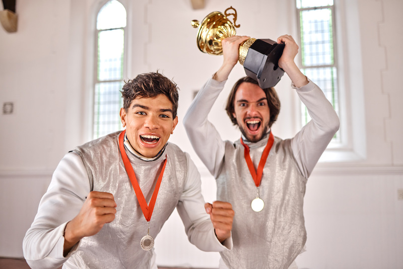 Sports, fencing and portrait of men with trophy for winning competition, challenge and match in gym.