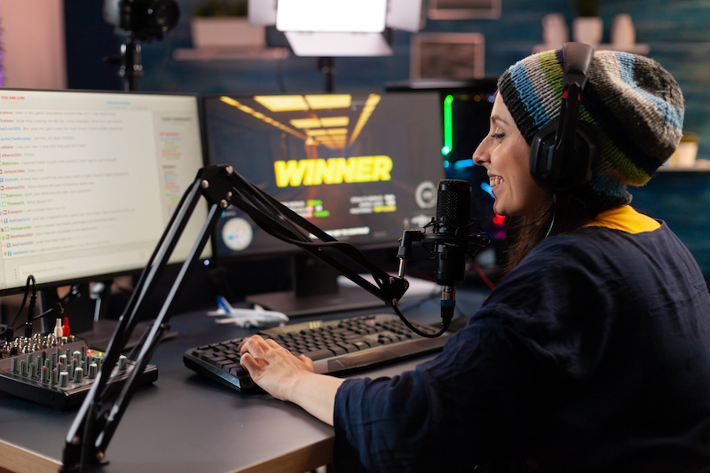 woman recording radio programme in a studio