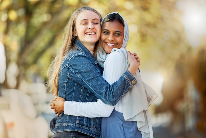 two girls hugging