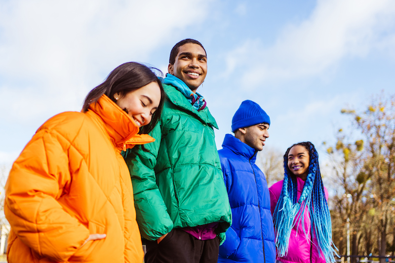 friends wearing puffy coats